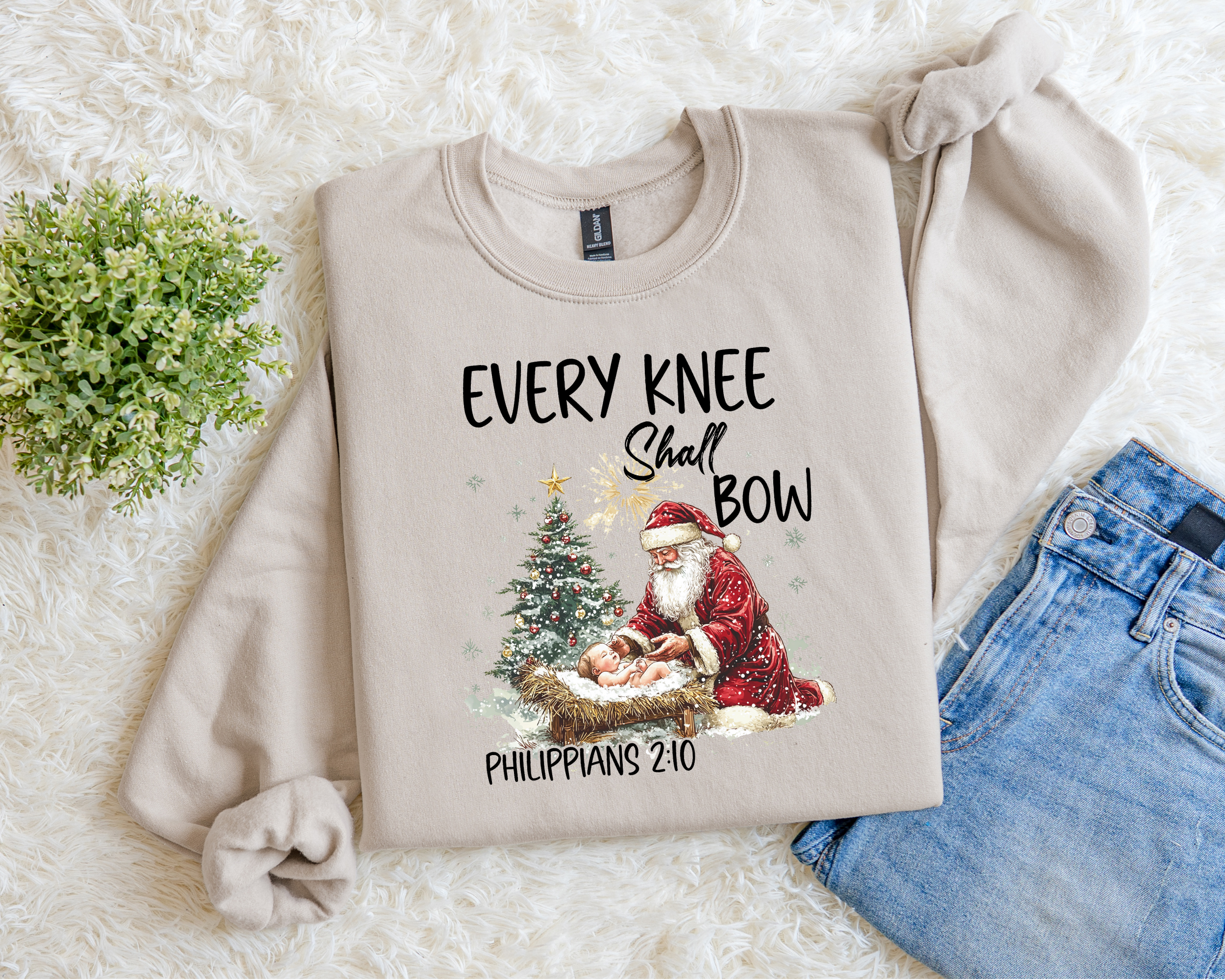 Every Knee Shall Bow (Santa And Baby Jesus) Sweatshirt.